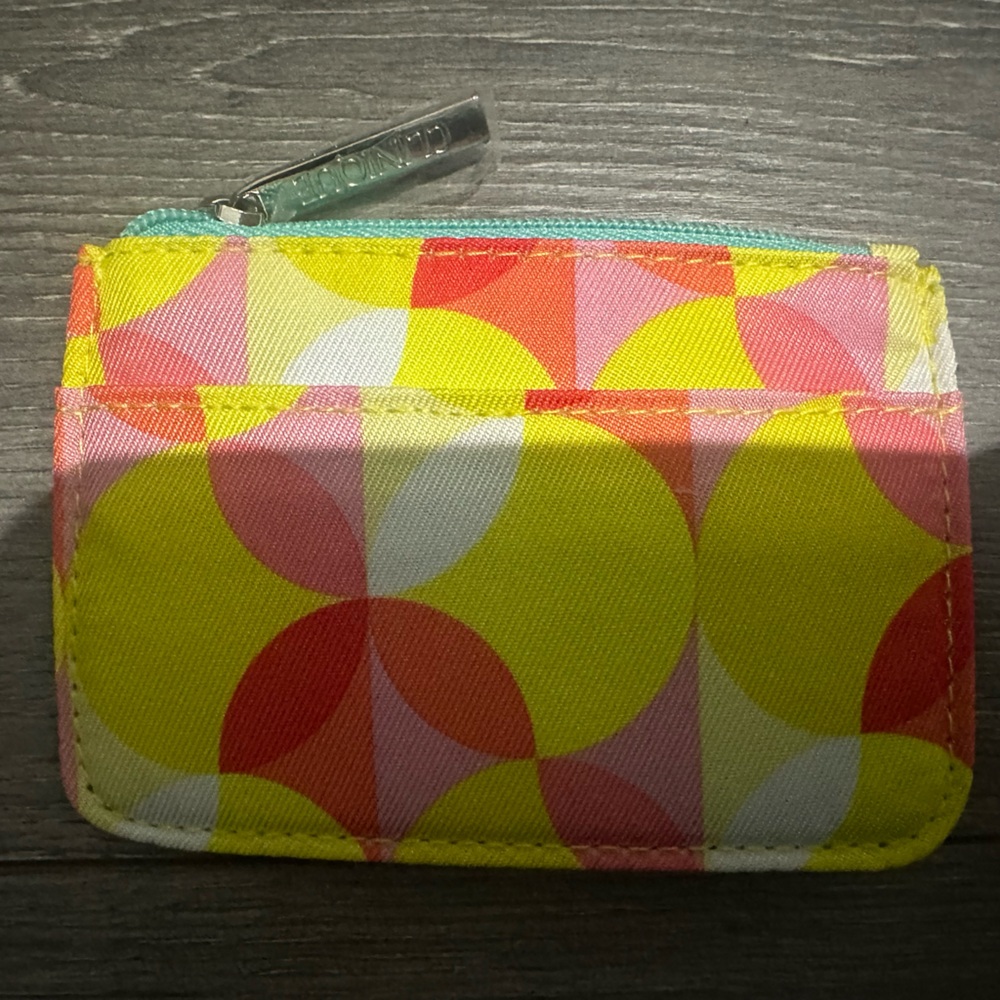 Clinique colorful geometric coin pouch.